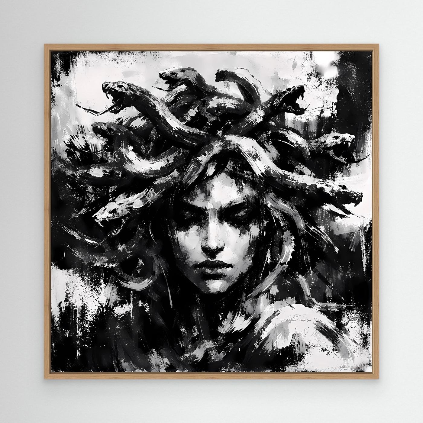 Oak-framed abstract Medusa portrait canvas in black and white, textured brush strokes.