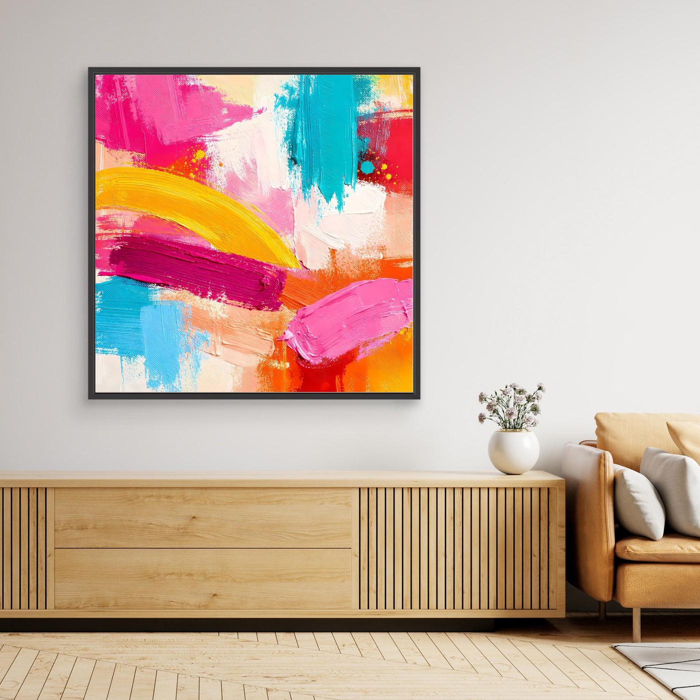 Black-framed abstract canvas wall art with pink, teal, orange and yellow brushstrokes