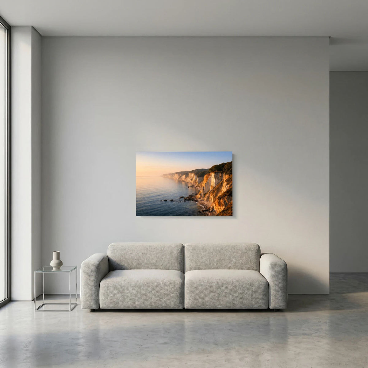 Wandbild mit Blick auf die Klippenküste und das Meer bei Sonnenaufgang