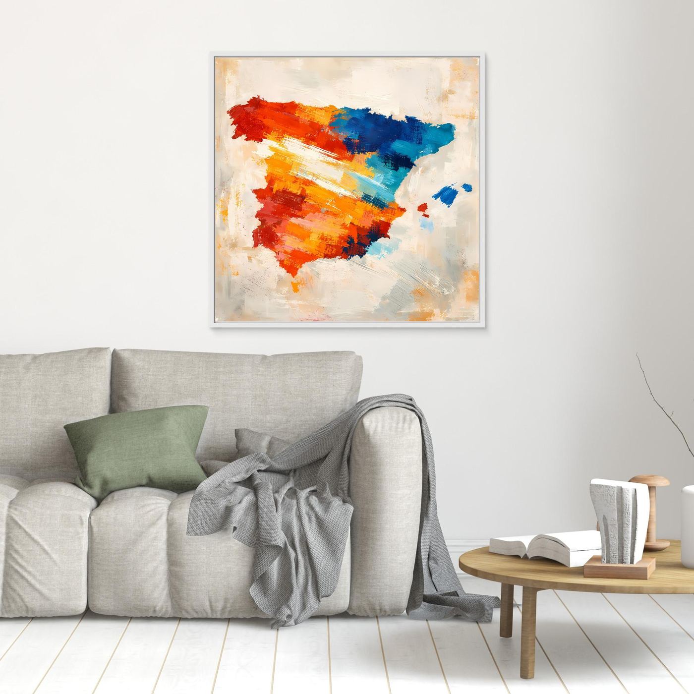 Abstract Spain map wall art with red and blue brush strokes on cream canvas, silver frame