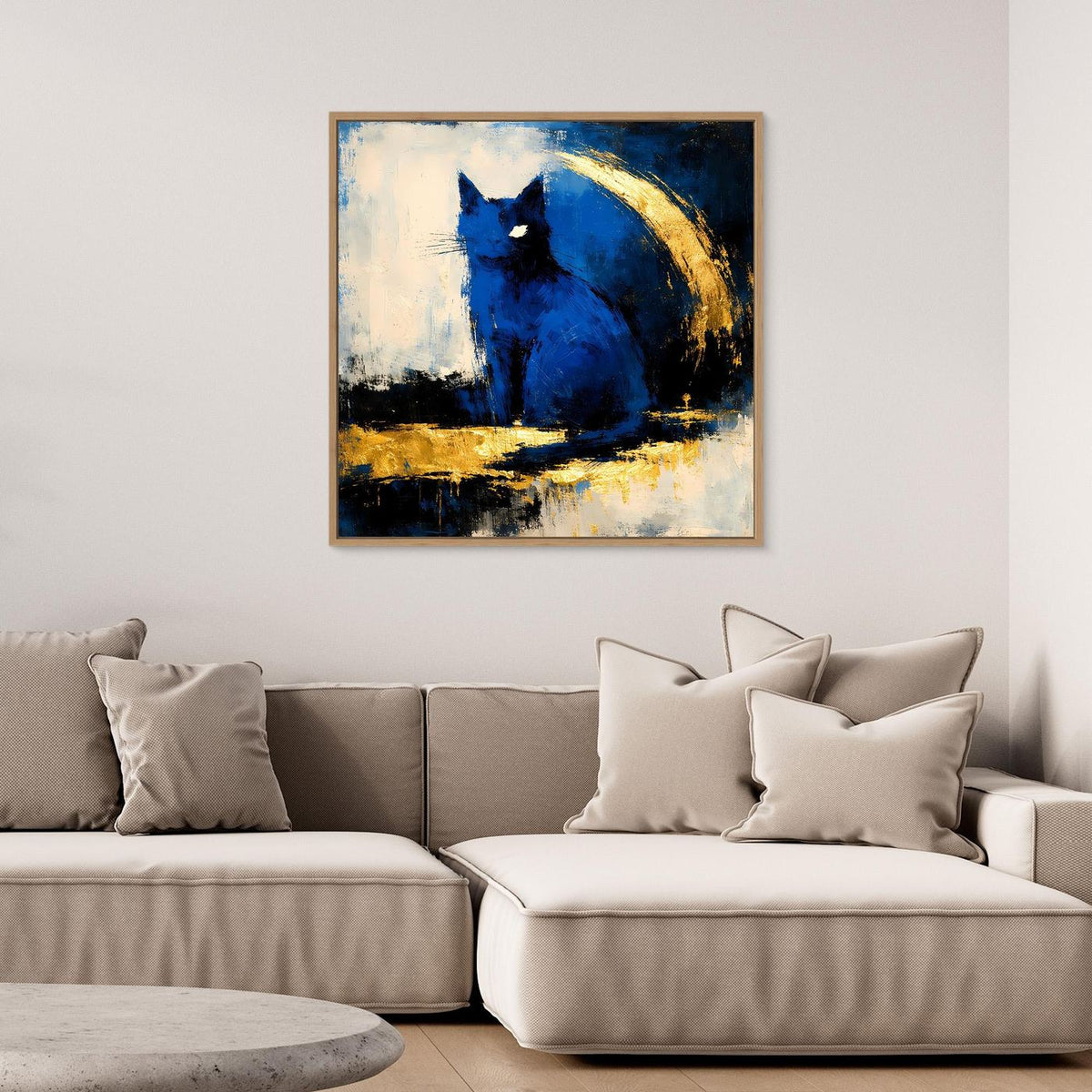 Gerahmtes Leinwandbild mit abstraktem Elefantenmotiv, blau und gold auf hellem Grund