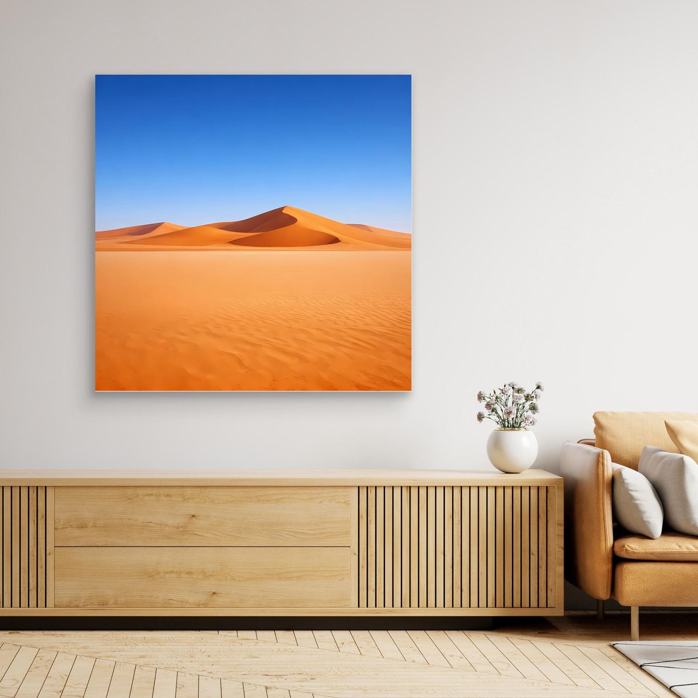 Leinwandbild mit Sanddünen ohne sichtbaren Rahmen, blauem Himmel und orangefarbenen Dünen.