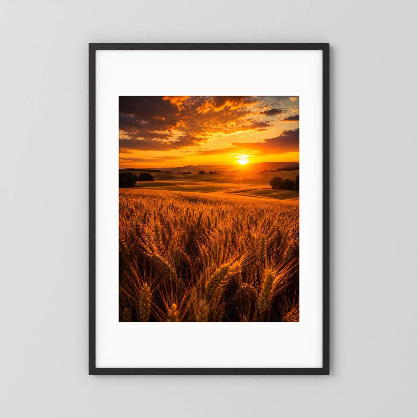 Poster im Hochformat mit Sonnenuntergang über goldenem Weizenfeld im schwarzen Rahmen mit weißem Rand