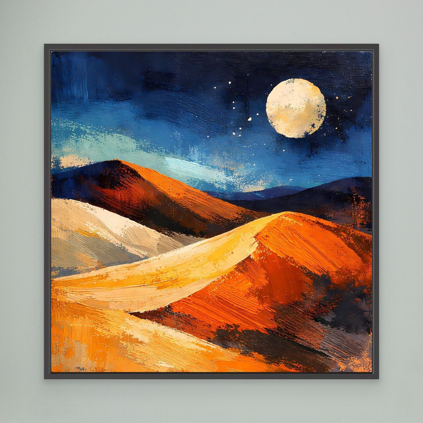 Abstract desert wall art with moon over sand dunes at night, in a charcoal dark frame
